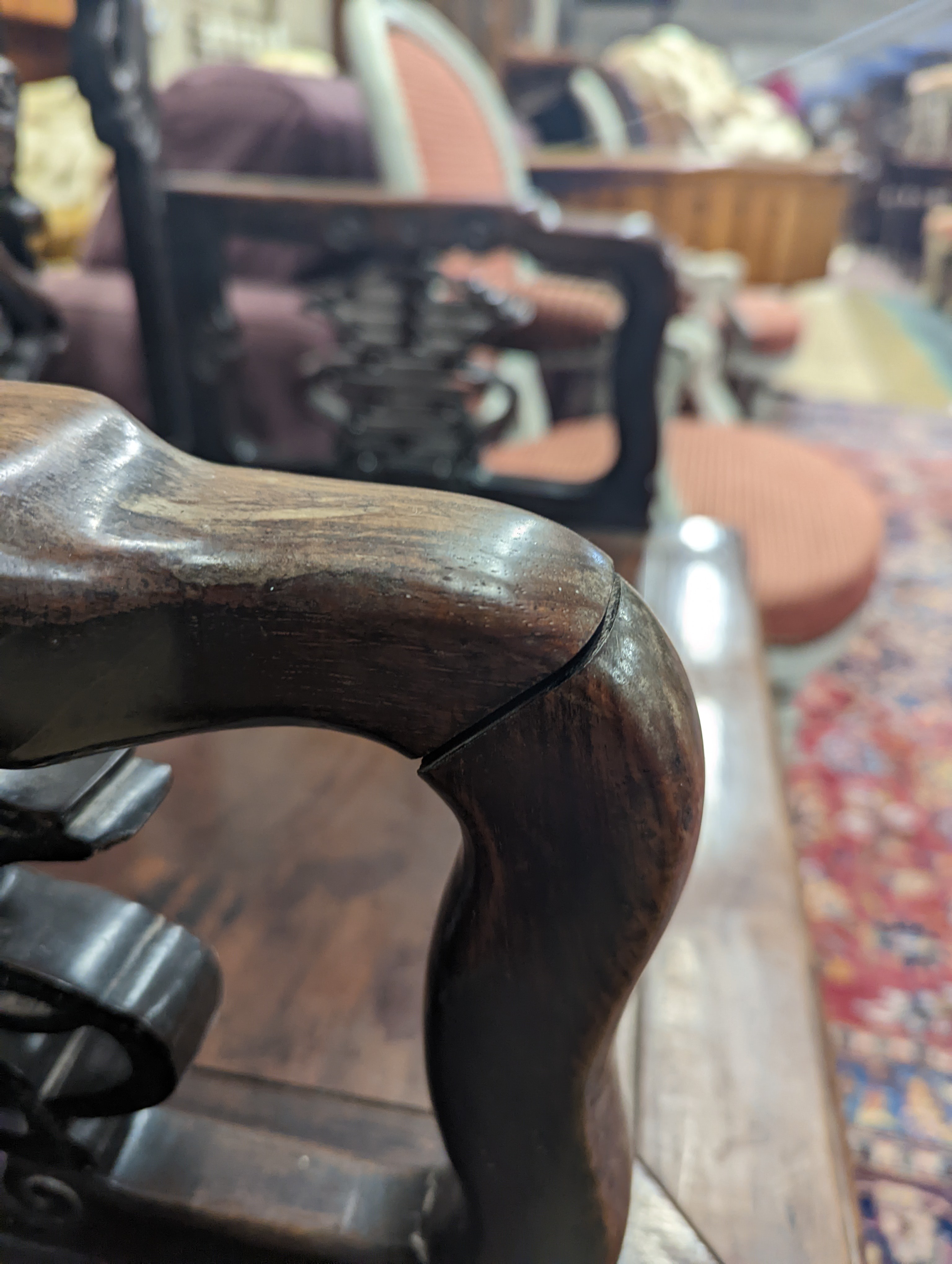 A pair of Chinese carved hongmu elbow chairs (a.f.), width 65cm, depth 48cm, height 96cm